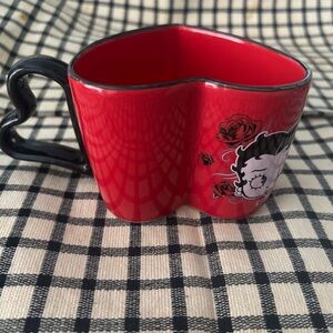 Heart-Shaped Red Mug with Cartoon Design